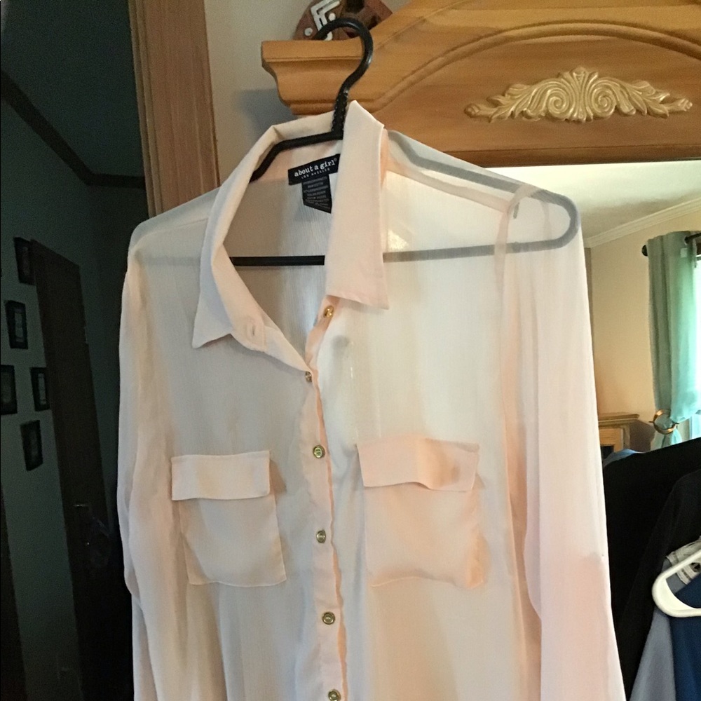 Peach colored 100% Polyester long sleeved shirt